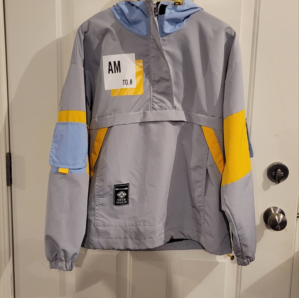 Men's windbreaker pull over size medium. This is more style vs. function.